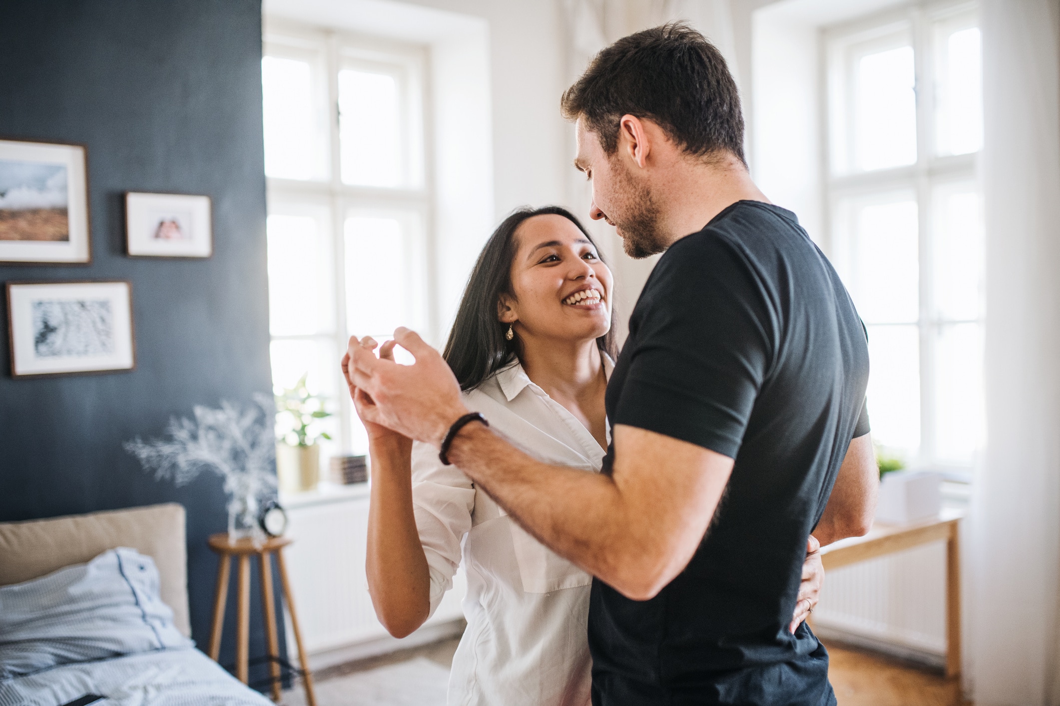 couple dancing in their home