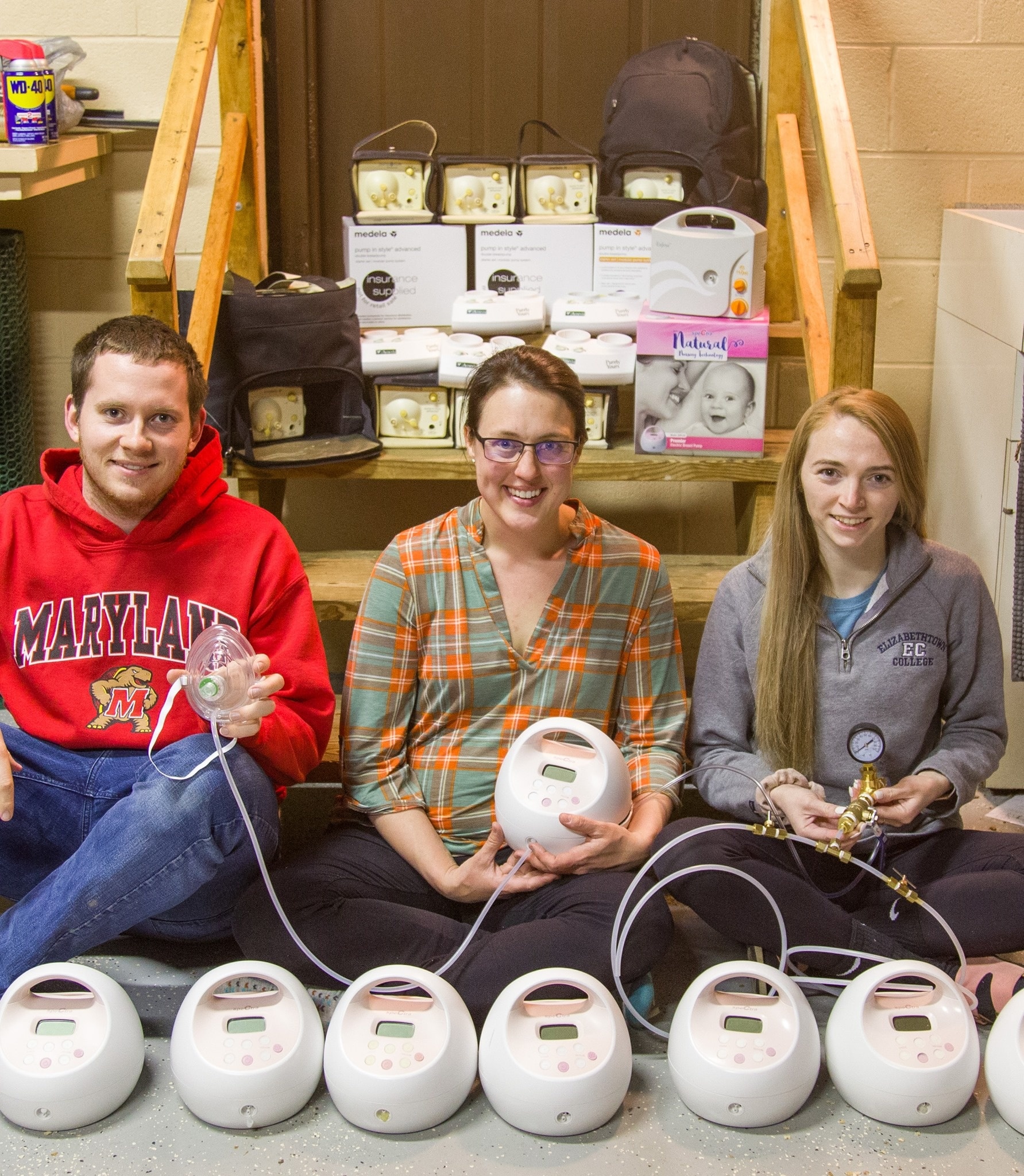 Brandi Gerstner and her team sitting beside breast pumps