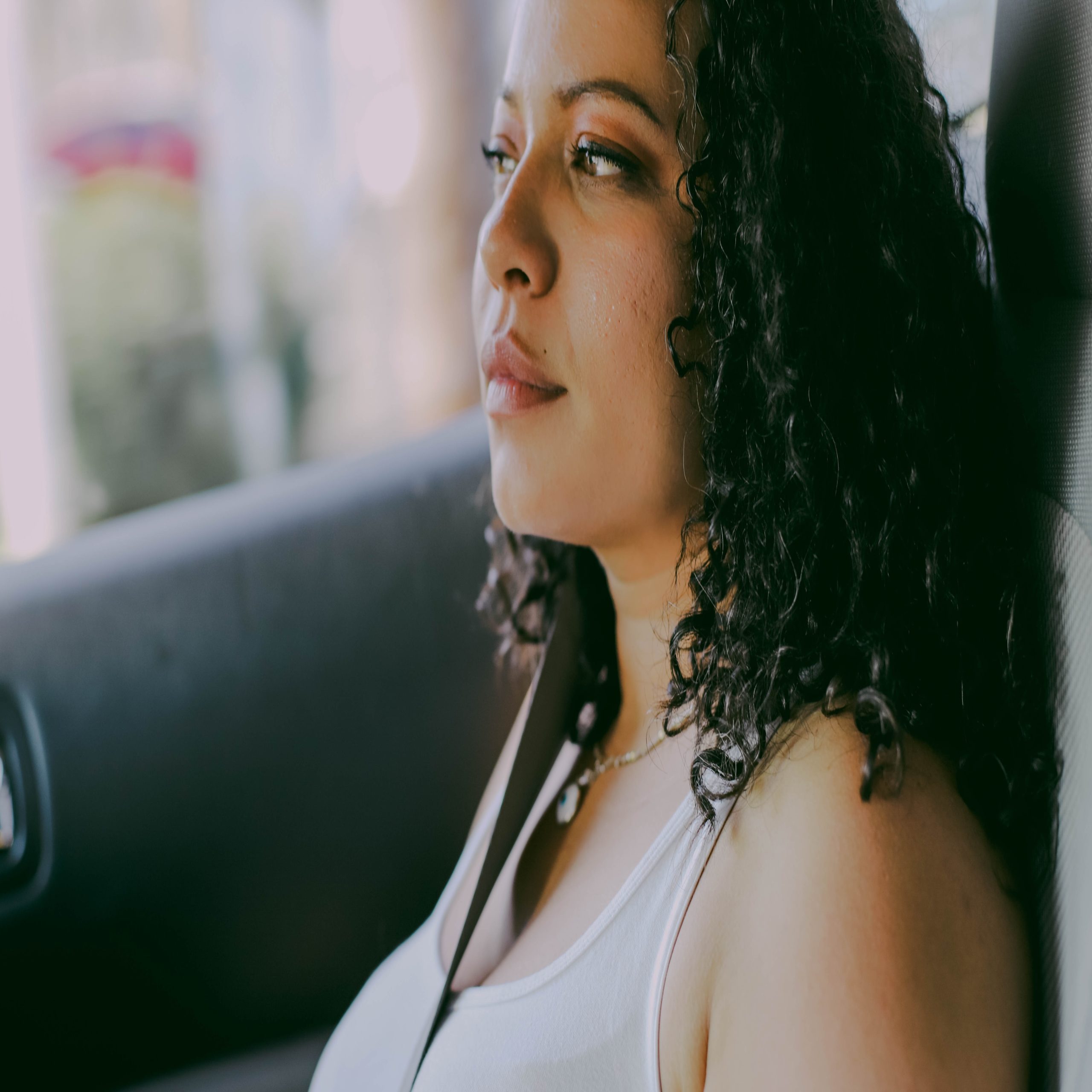 woman crying in a car