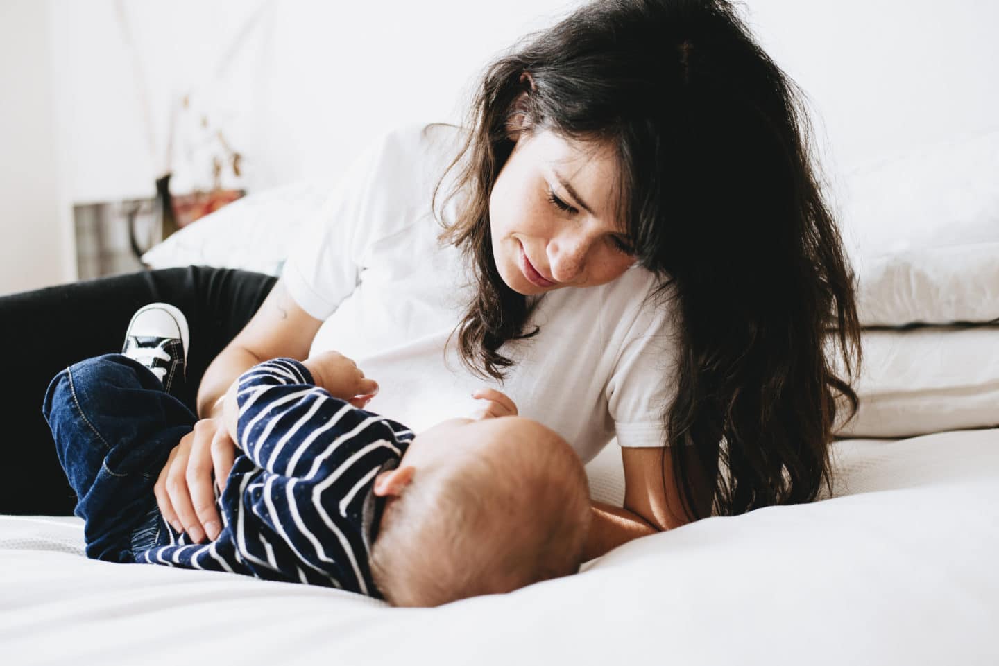 woman breastfeeding baby
