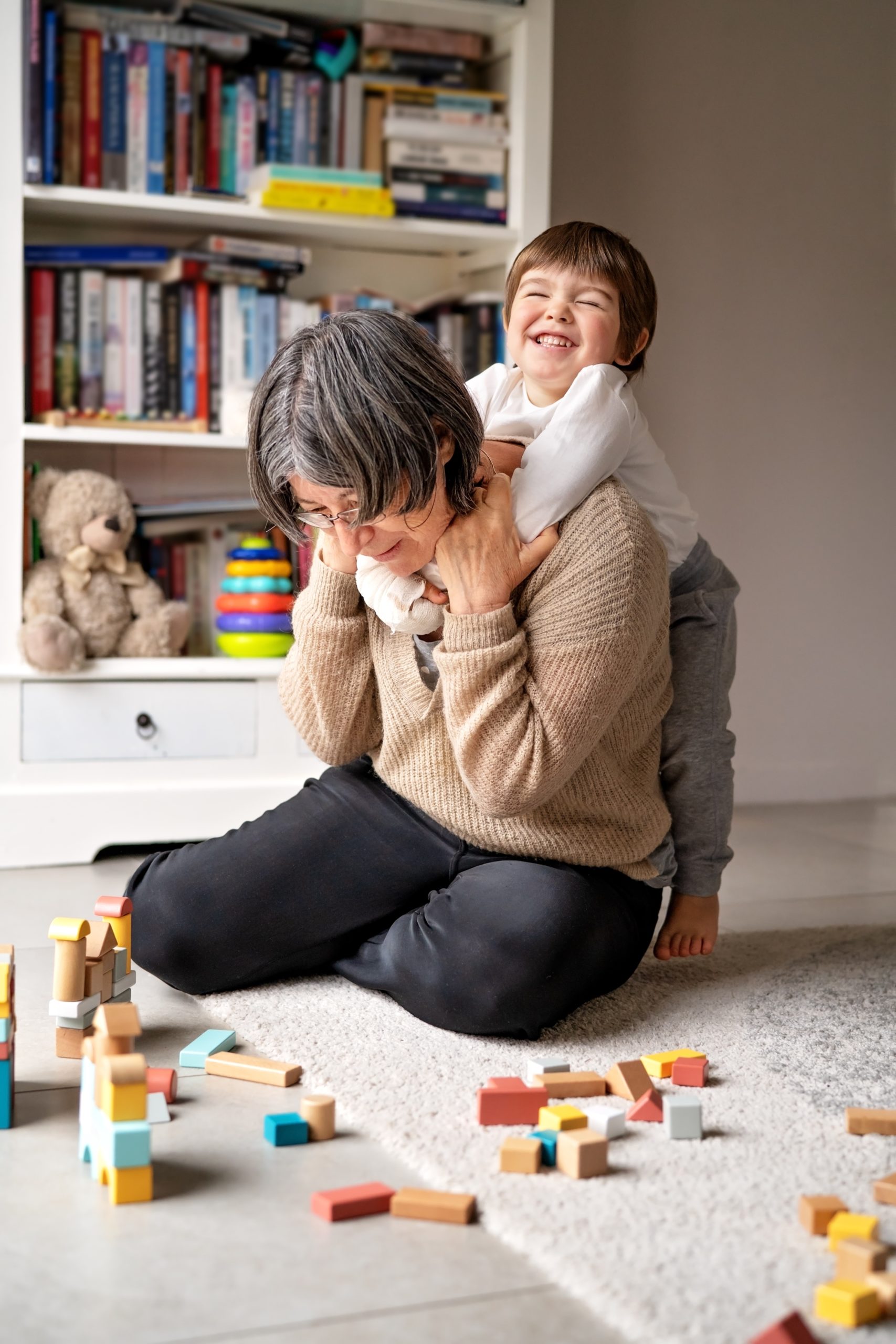 grandma playing with toddler