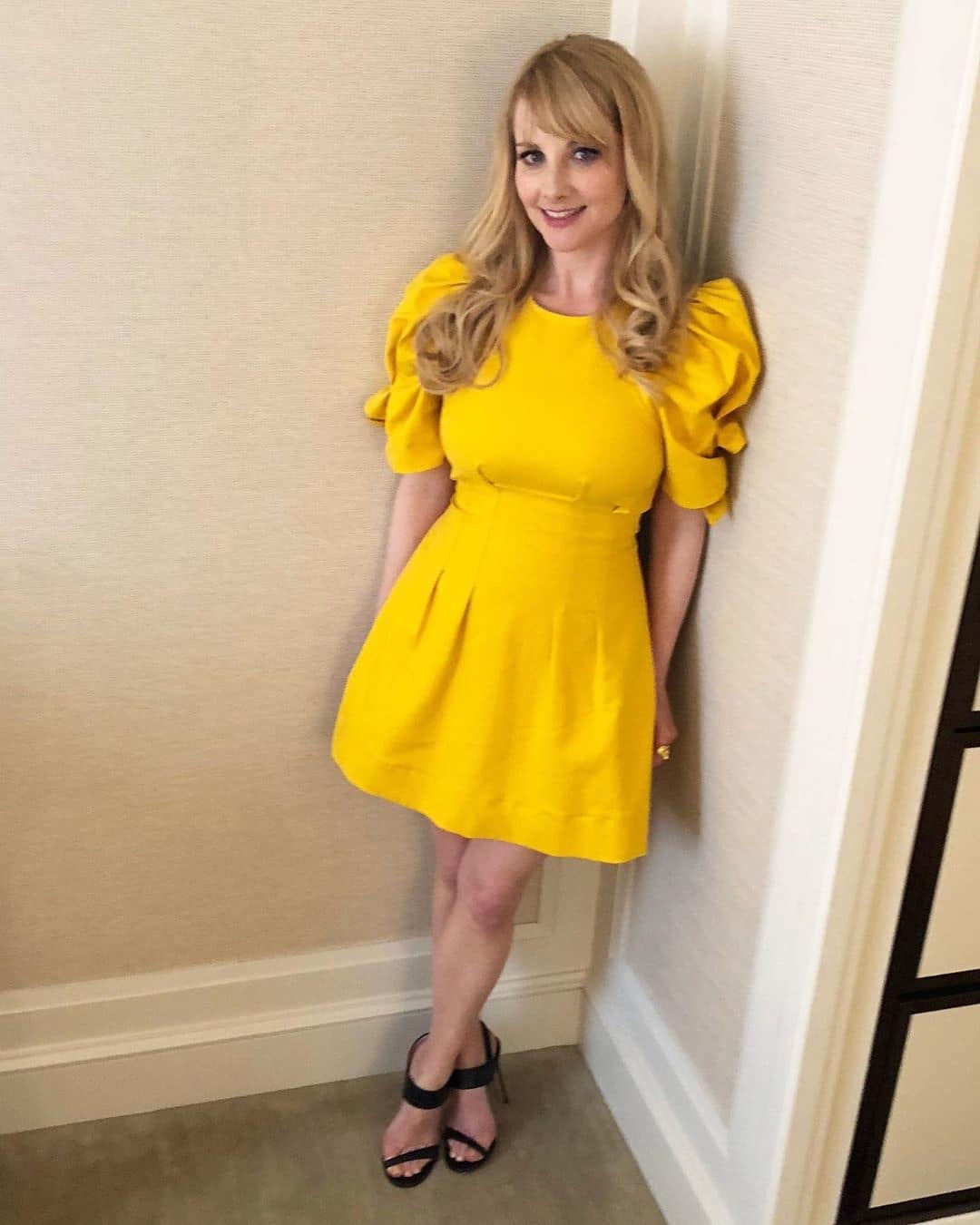 Melissa Rauch in a yellow dress