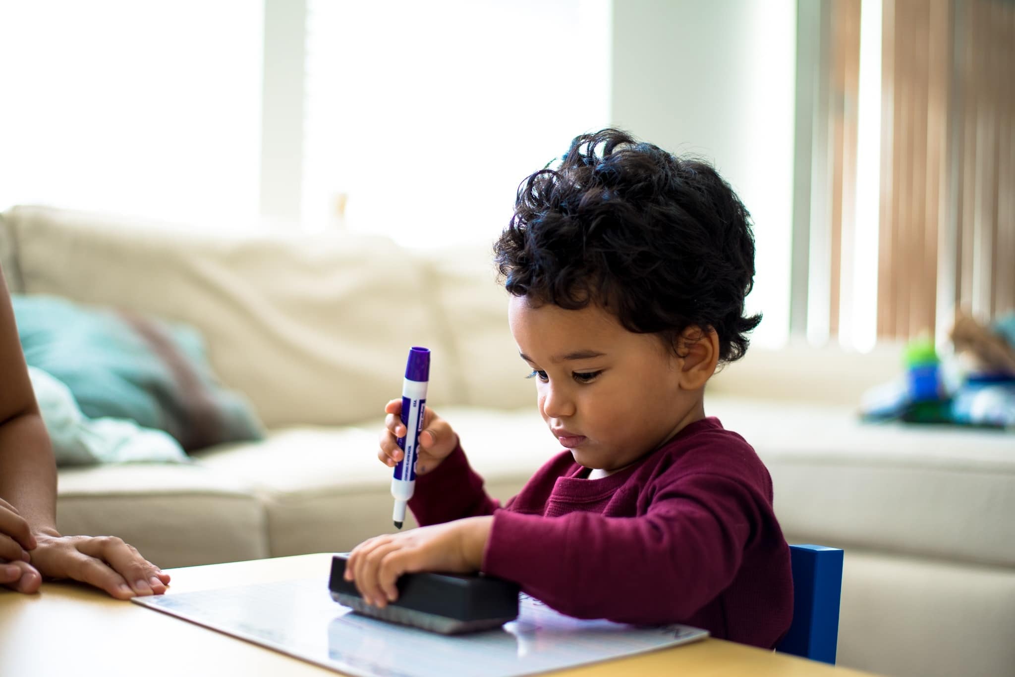 little boy coloring