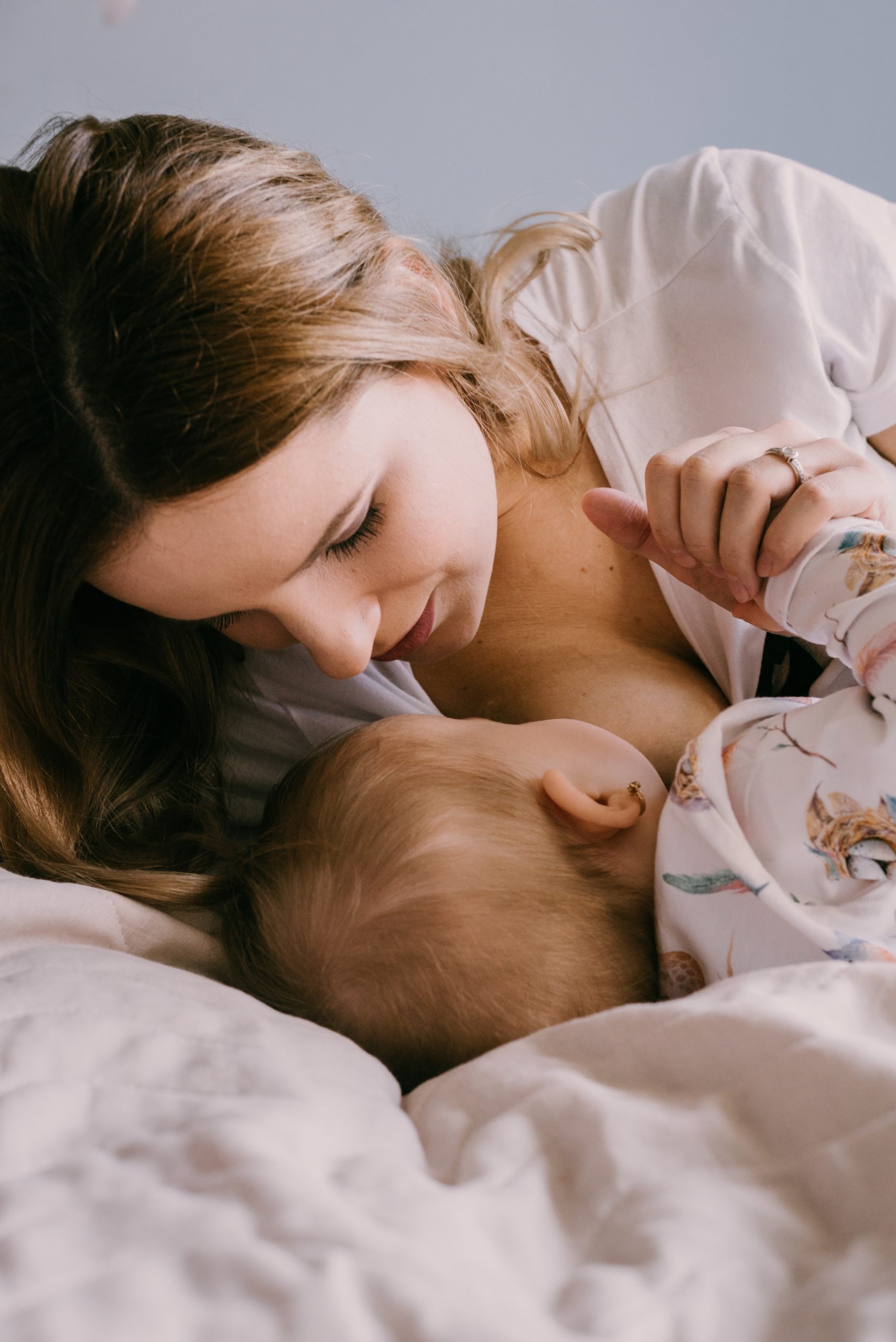 woman breastfeeding baby