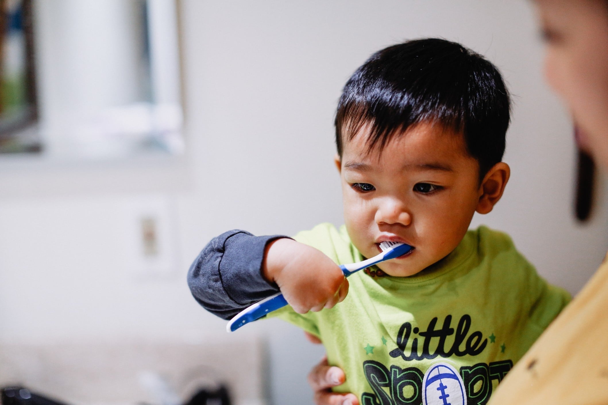 toddler brushing teeth