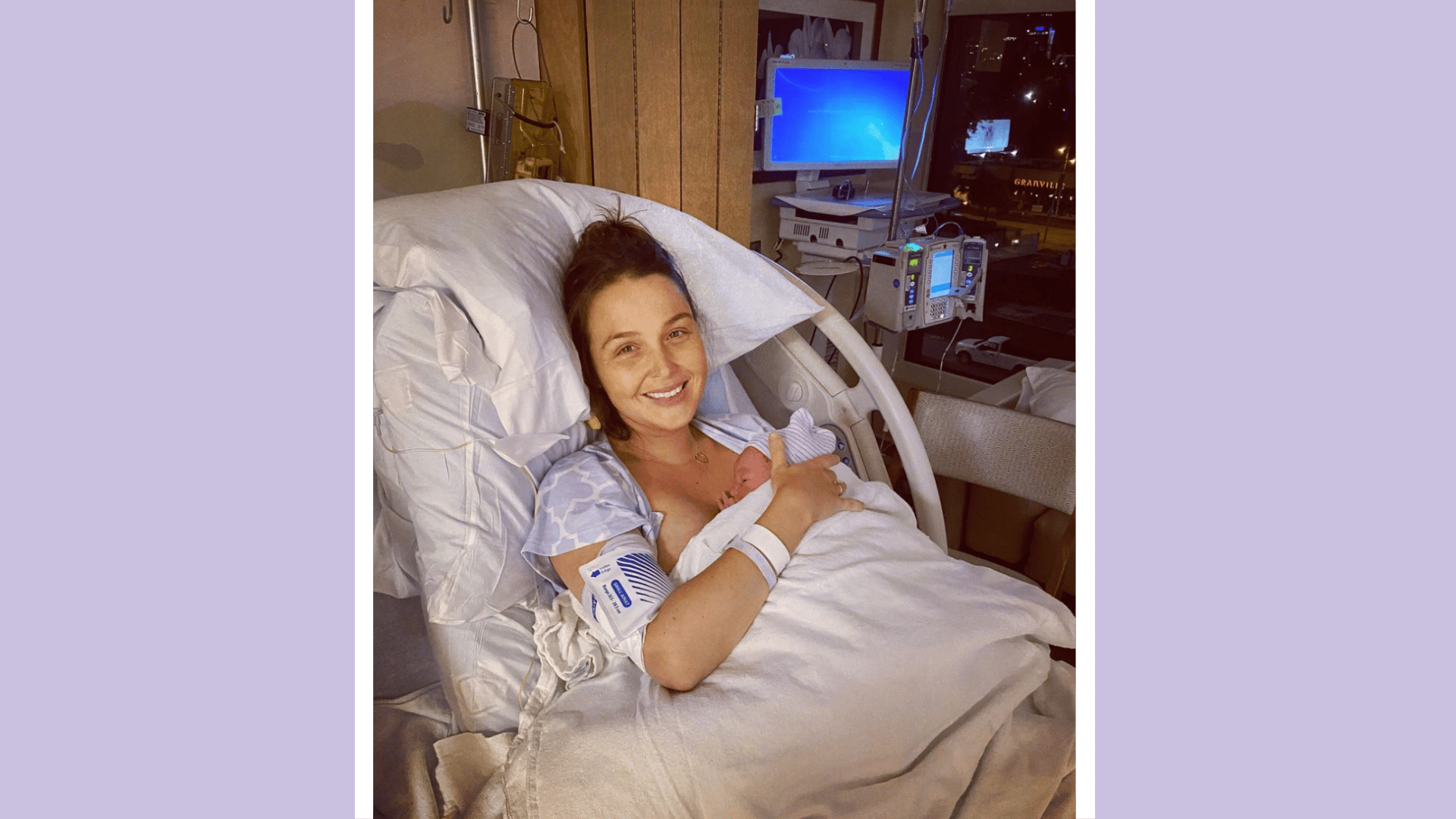Camilla Luddington holding newborn in the hospital