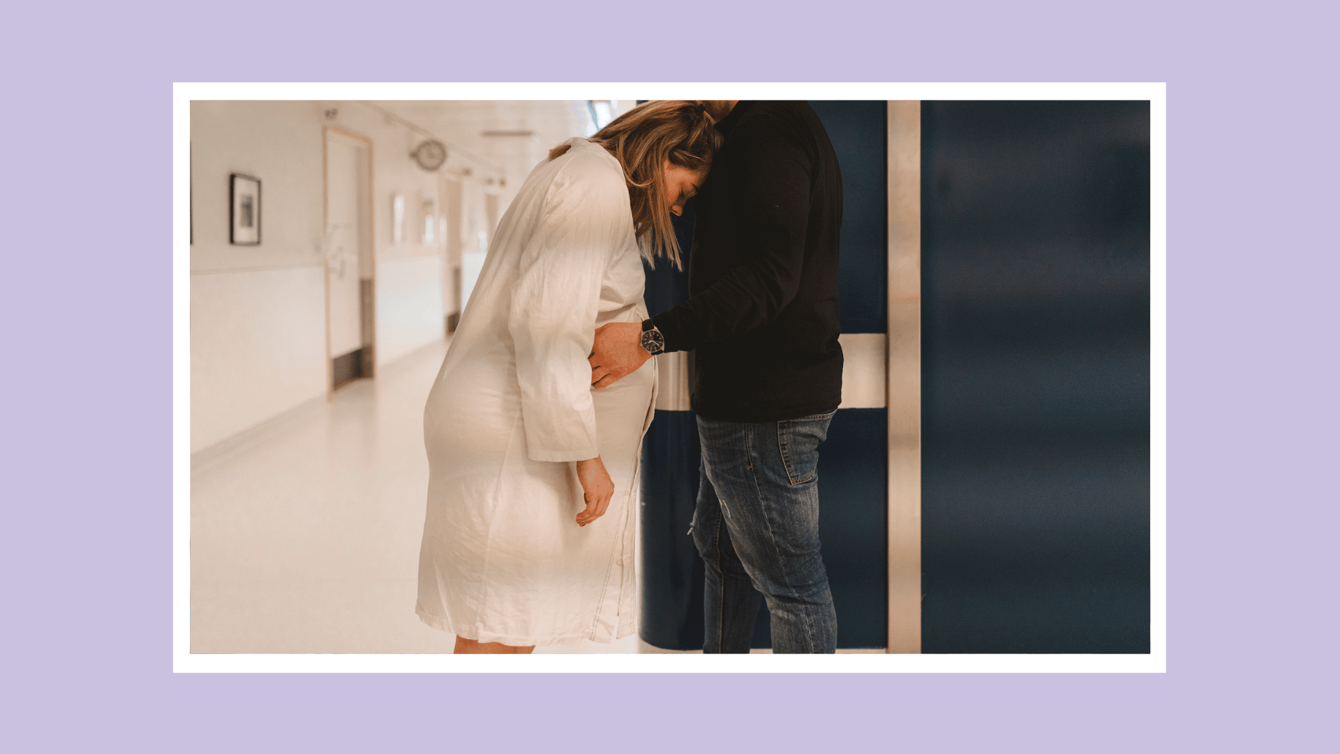 man comforting woman in labor