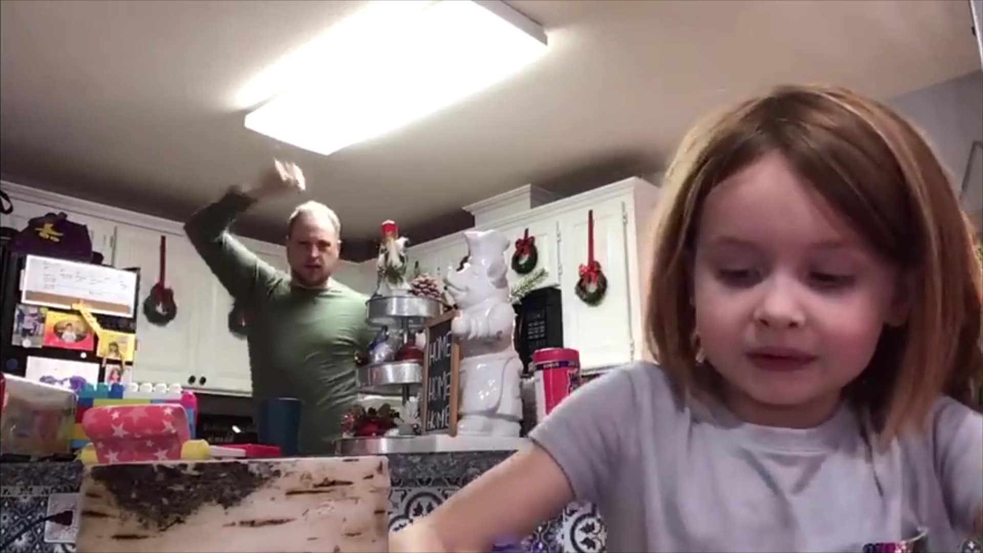 screenshot of a dad dancing in daughter's school video