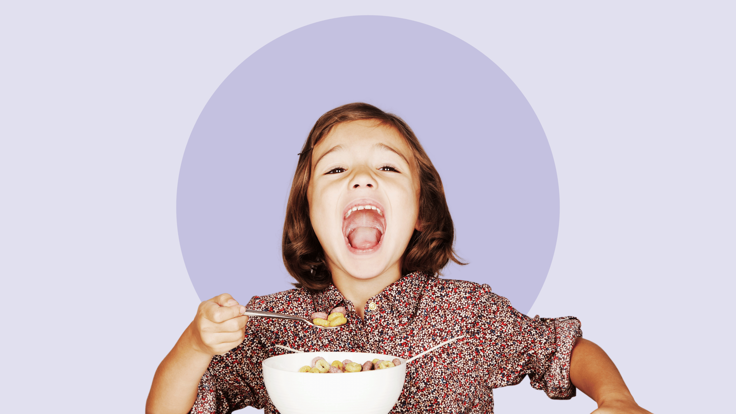 little girl eating cereal