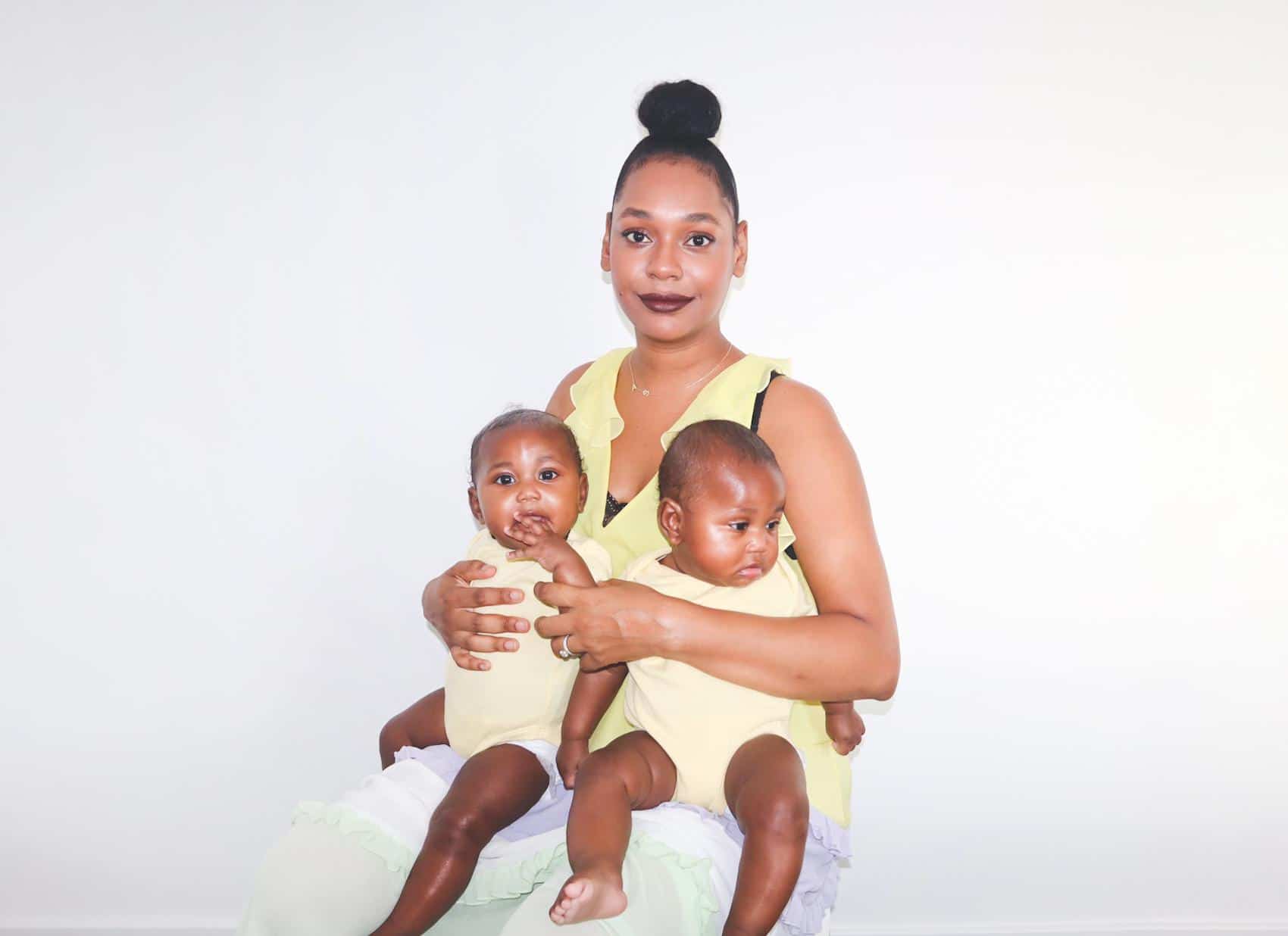 zara oteng with her daughters on her lap- letter to my daughter