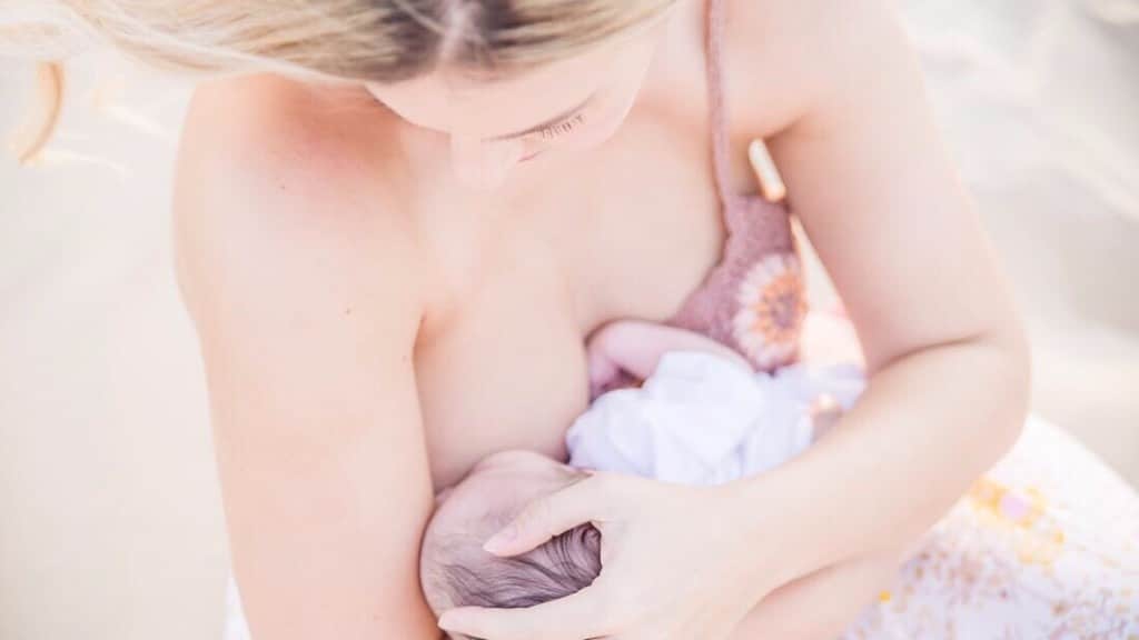 mom breastfeeding baby