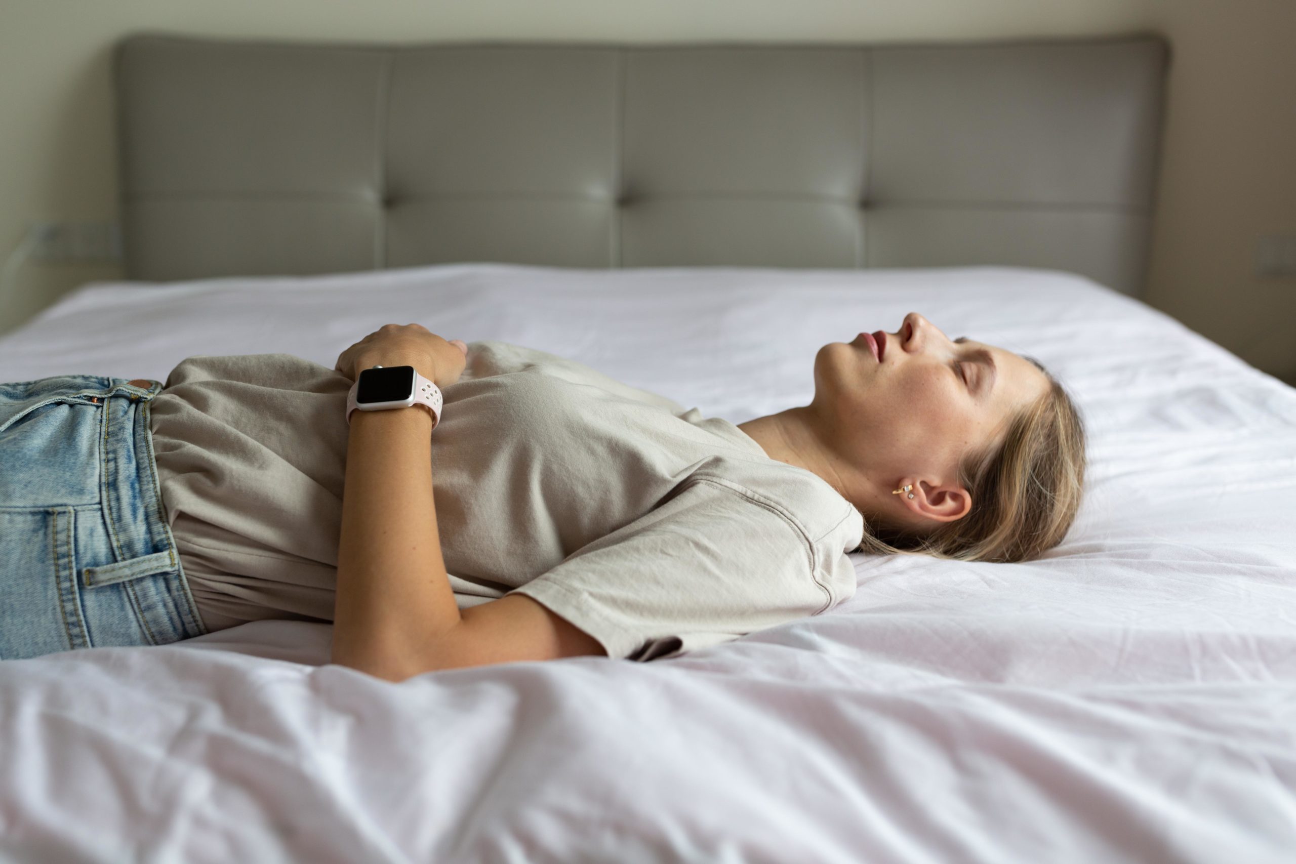 woman sleeping on the bed