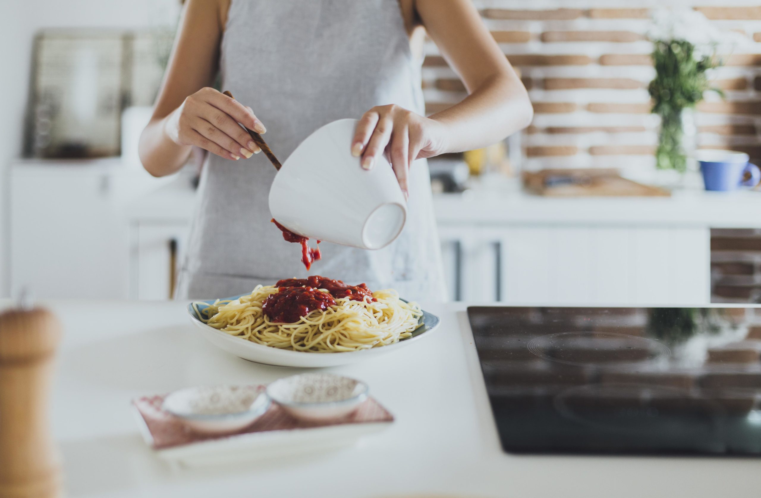 woman cooking pasta