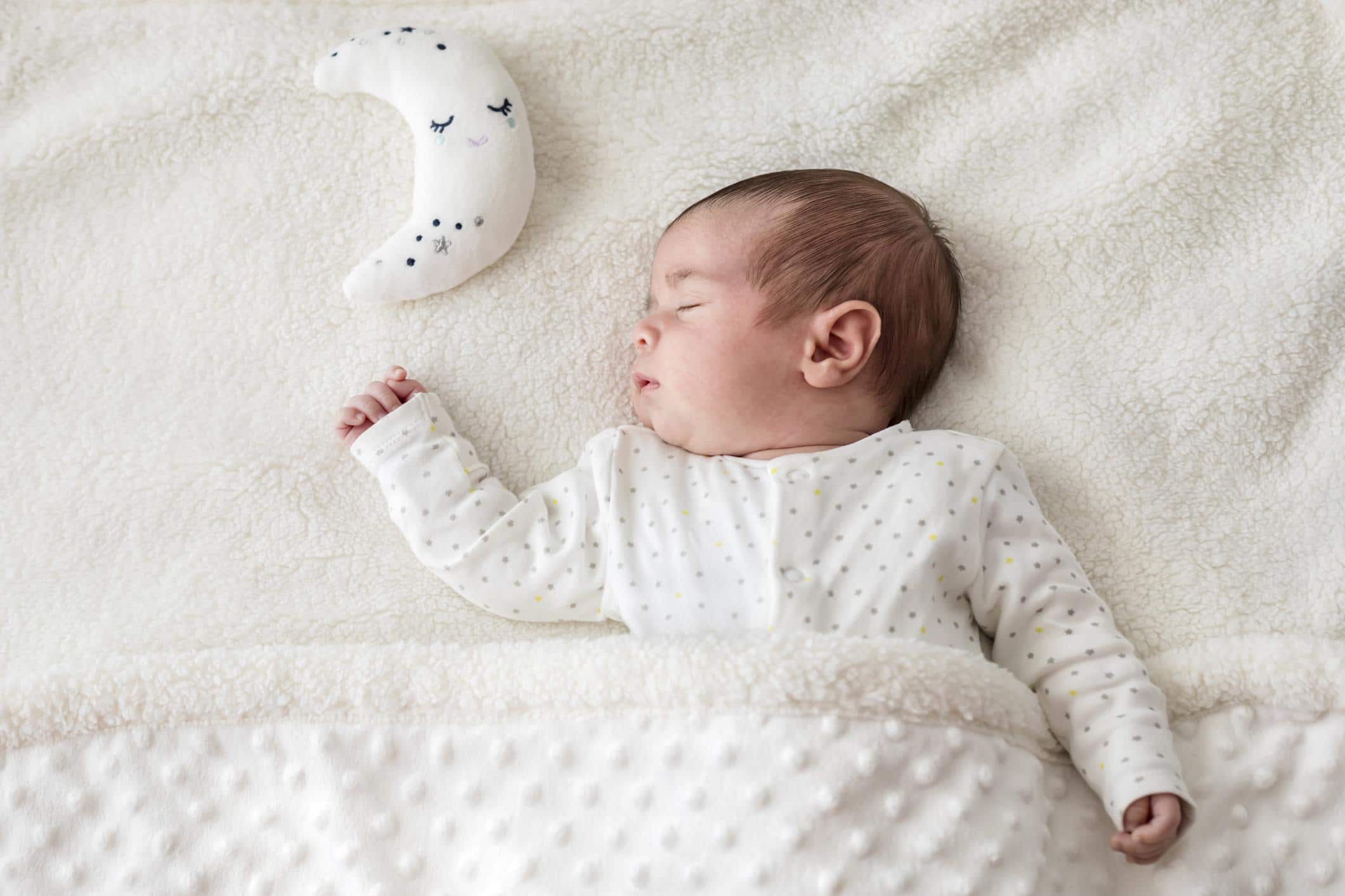 sleeping baby with moon pillow- cancer zodiac names