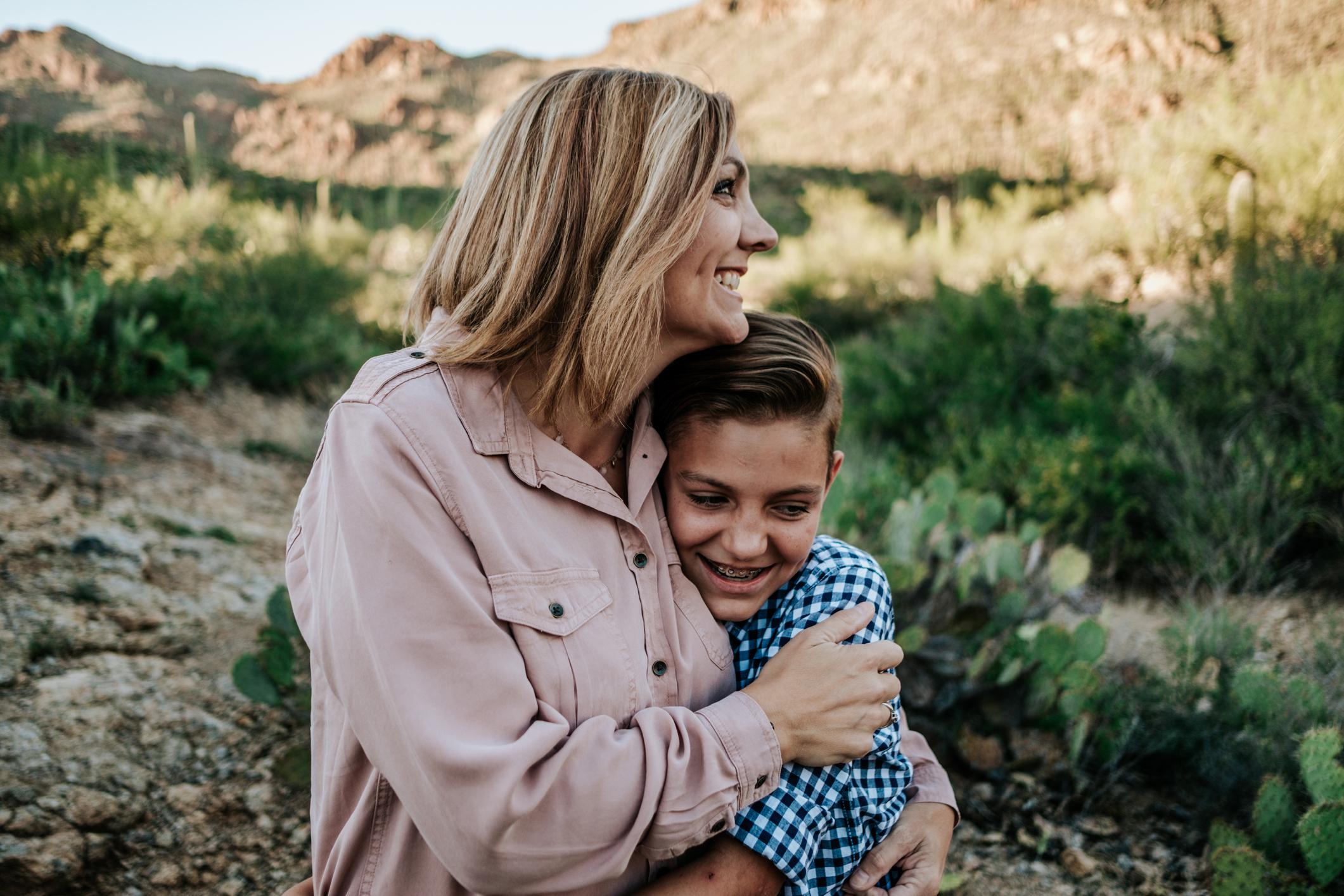 mom hugging son