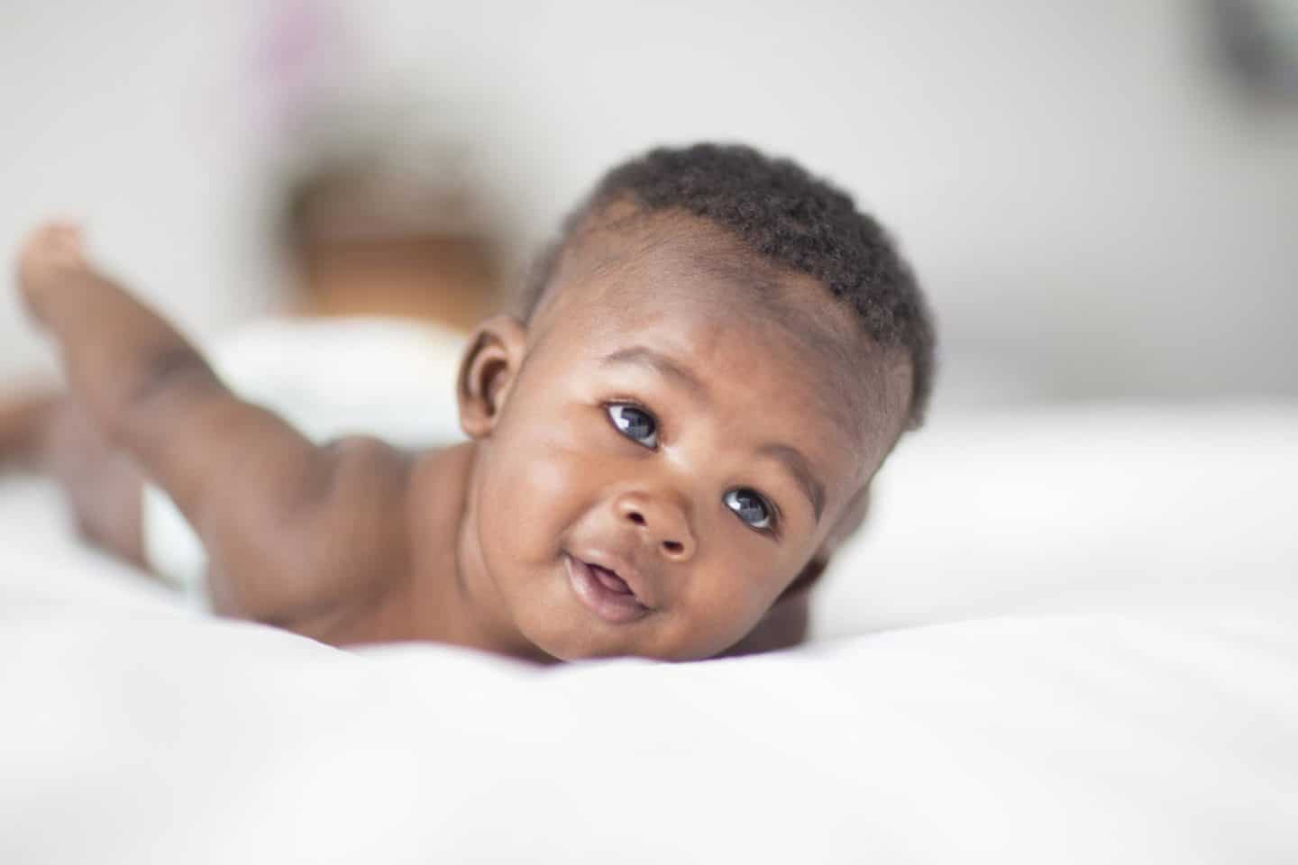 baby boy doing tummy time