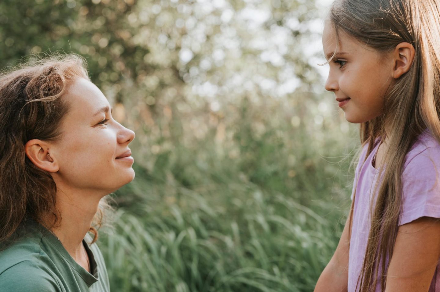mom talking to daughter on her level