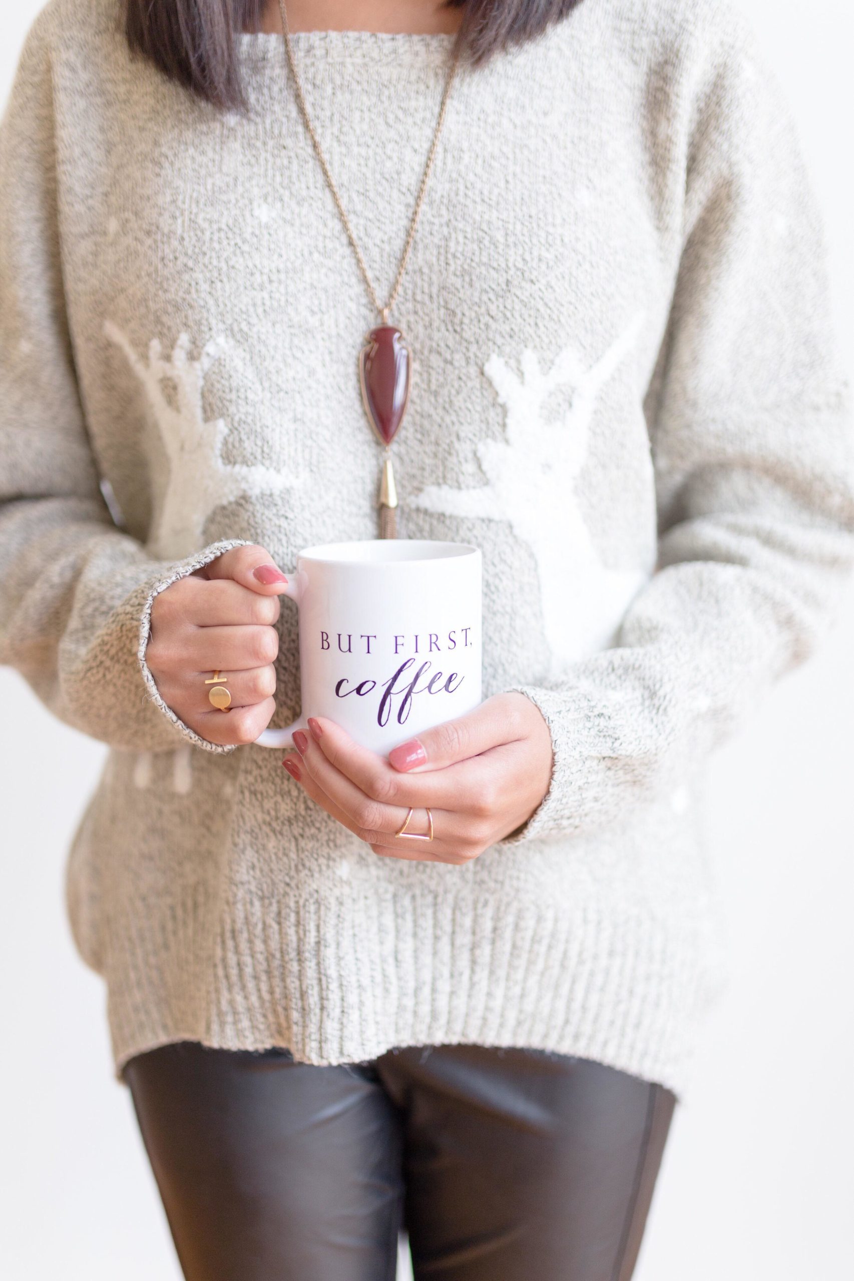 woman holding a cup of coffee