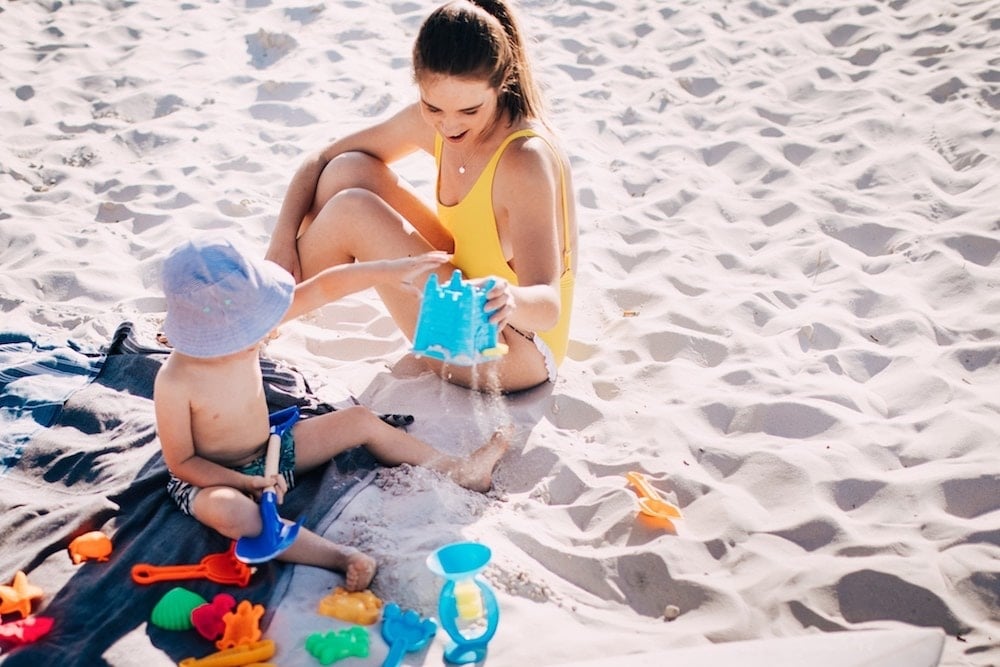 mom and son on a beach