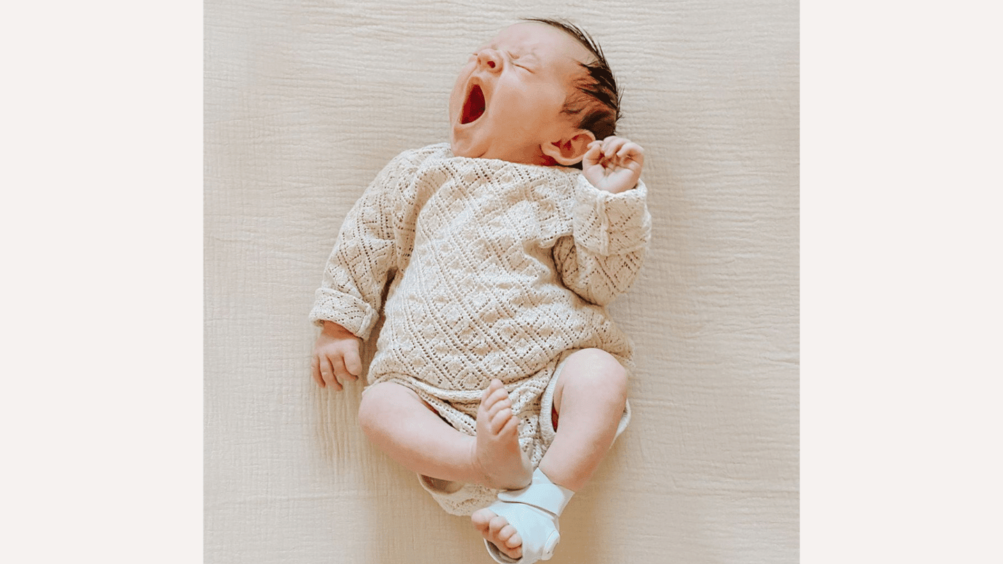 newborn-baby-sleepy-wearing-owlet-smart-sock
