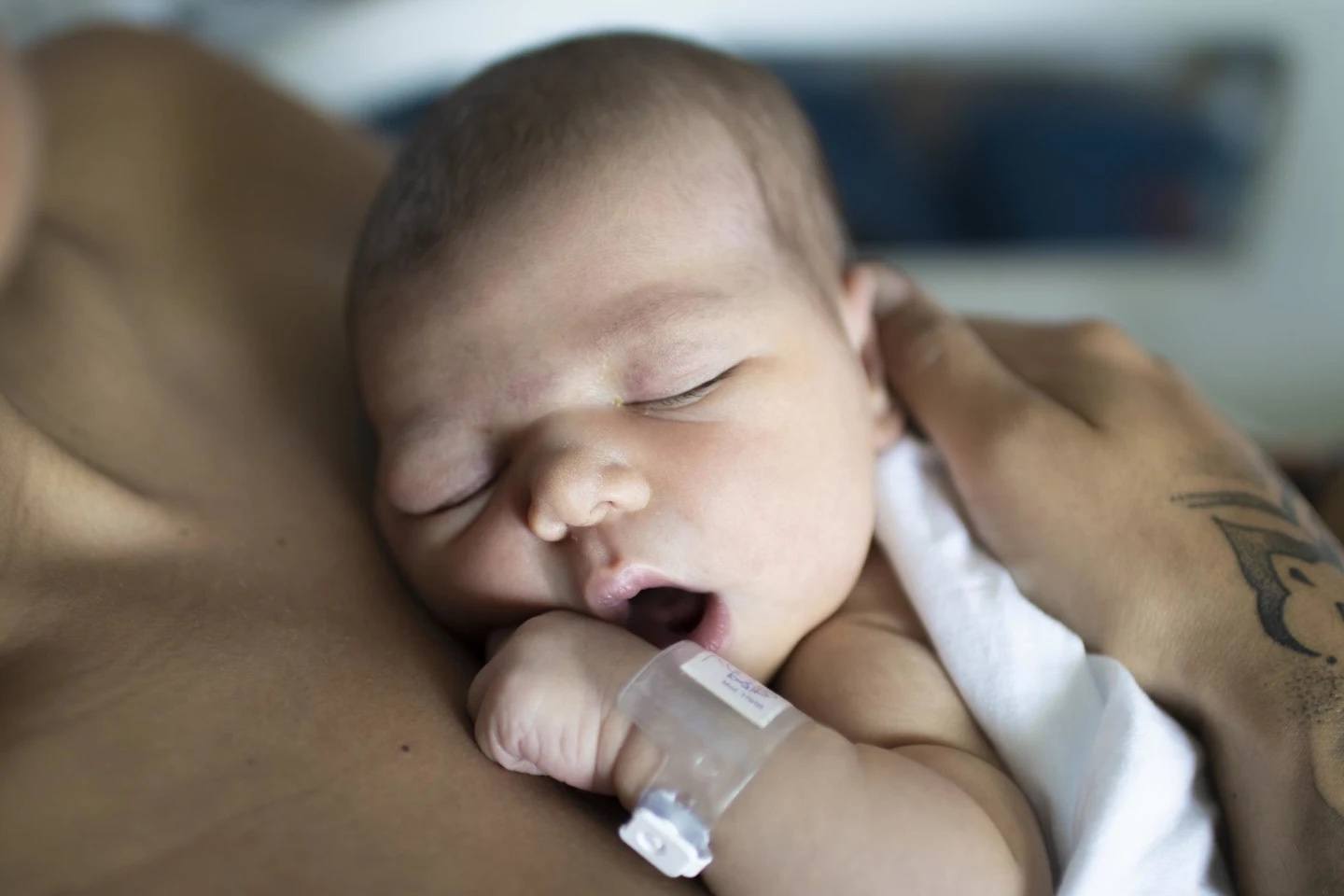 cute newborn baby with whose parents debated gender neutral names