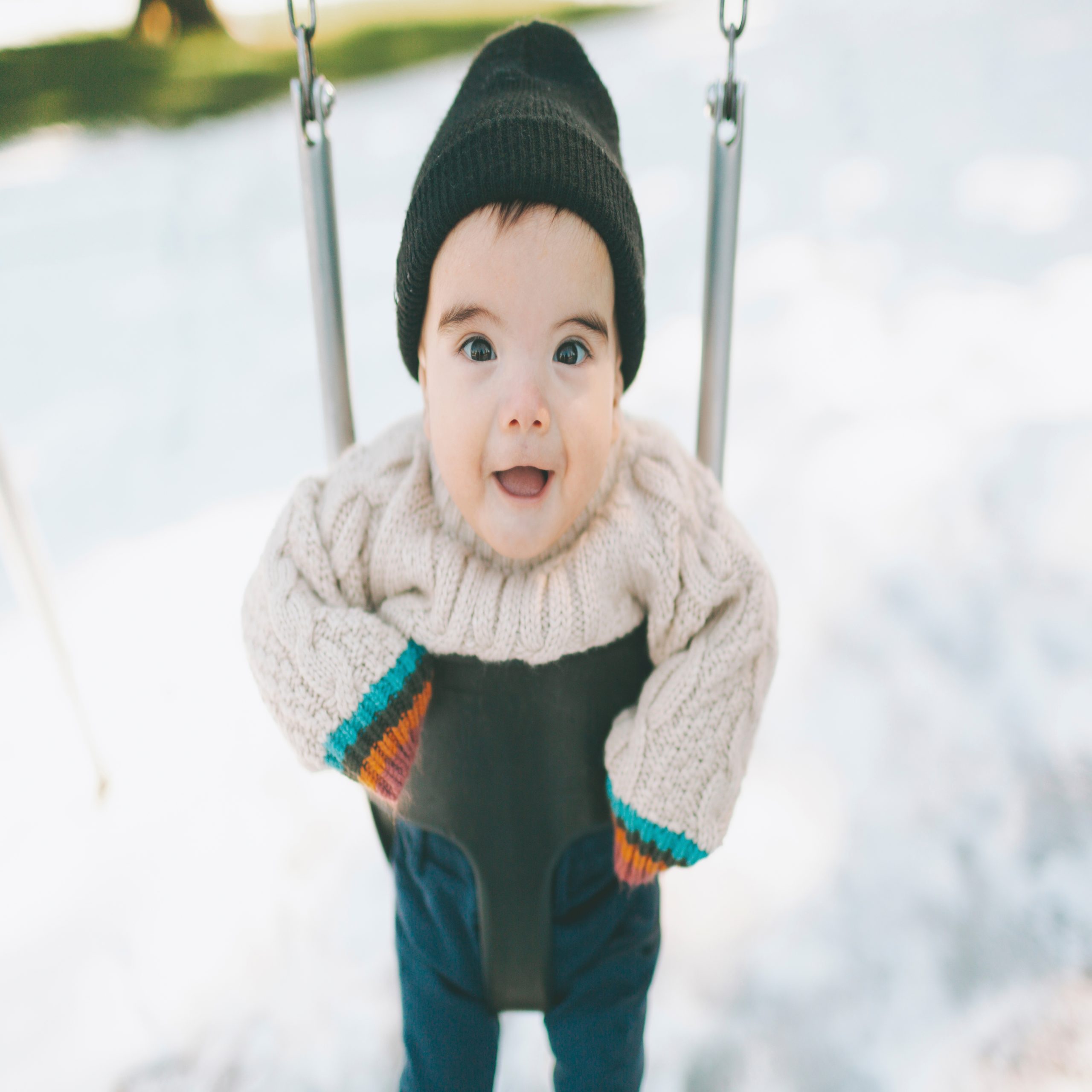 winter baby on swing set- capricorn baby names