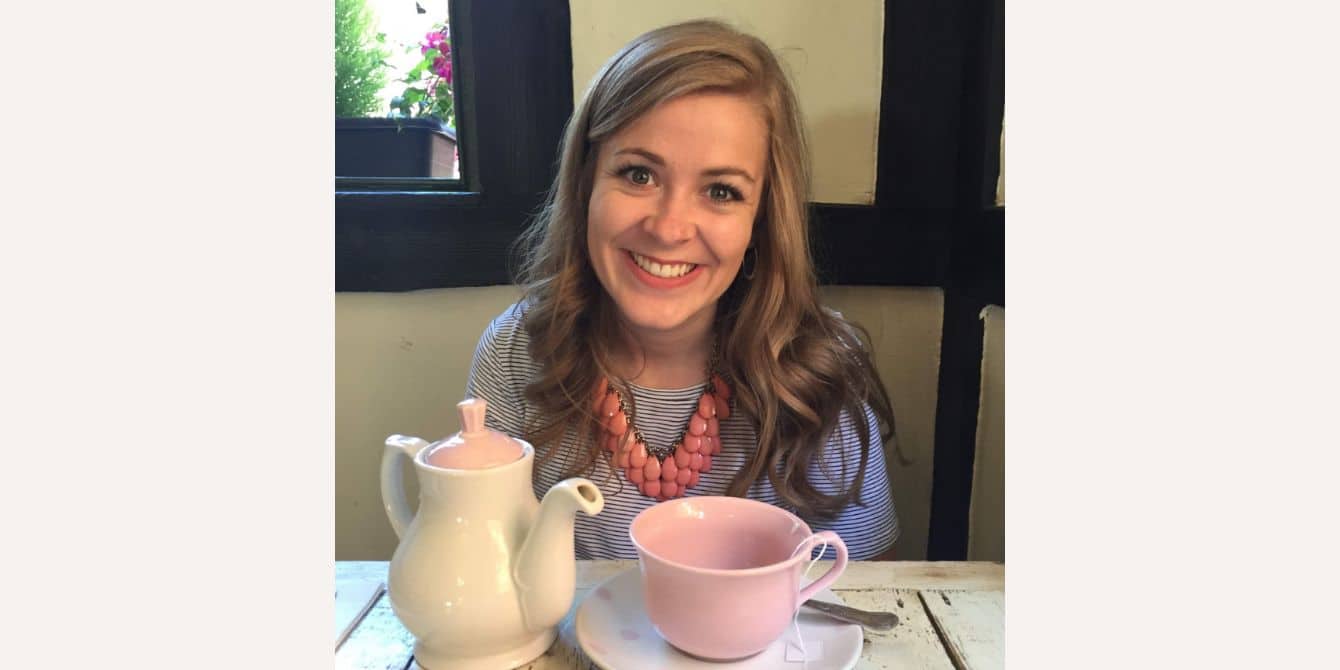 woman having tea - essay on struggles with motherhood