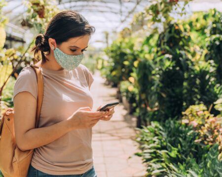 woman wearing protective face mask during coronavirus t20 9k91aK