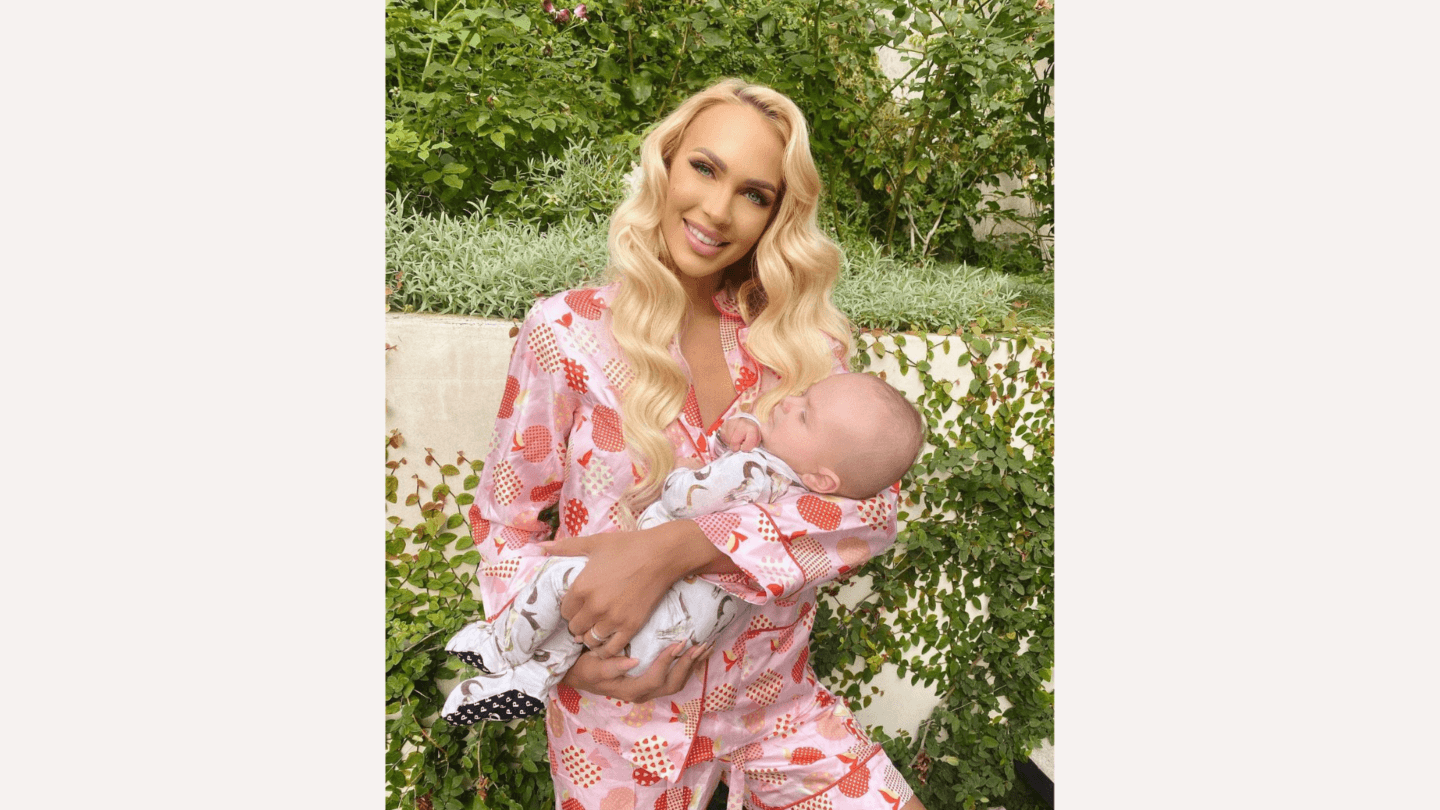 Christine Quinn holding her infant son