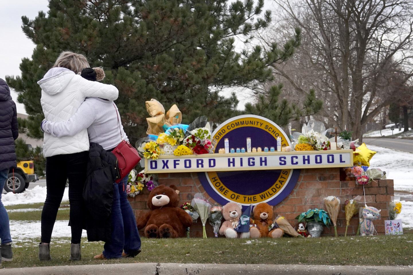 People mourning at Oxford High School