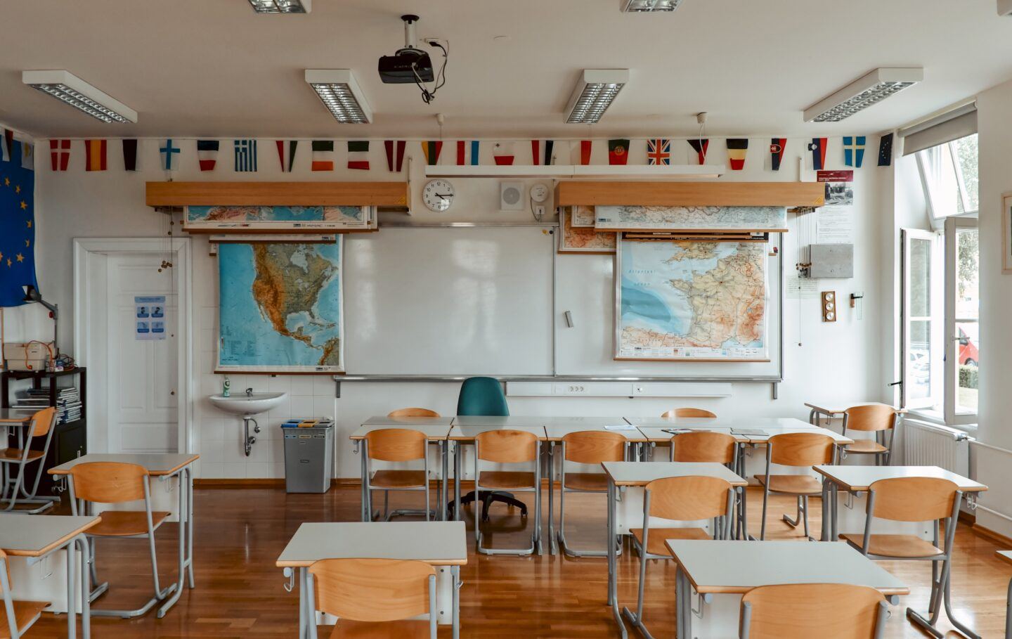 empty school classroom and empty desks