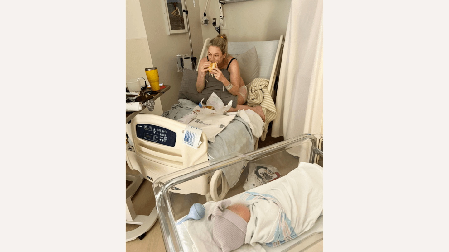 Iliza Shlesinger eating in a hospital bed