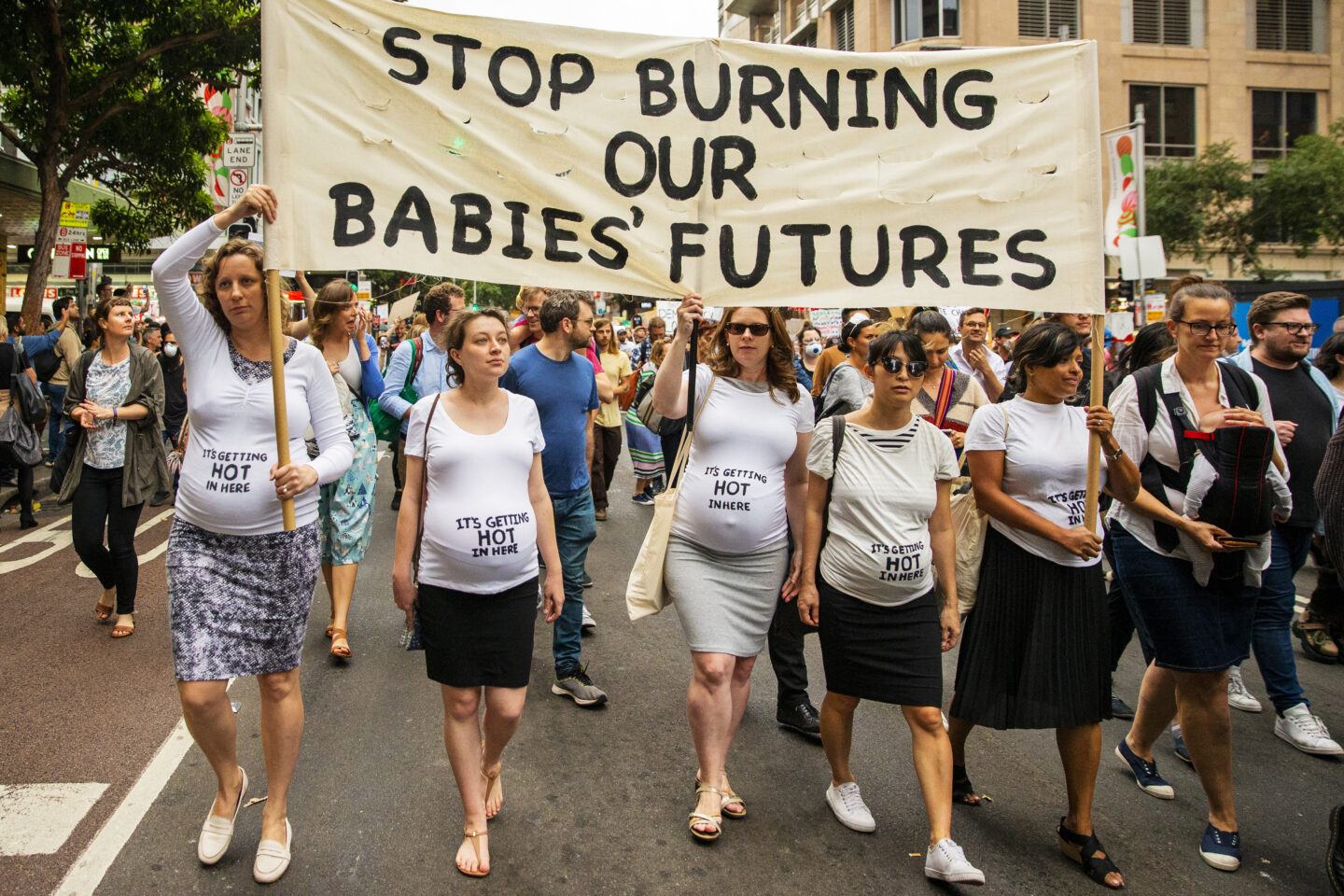 pregnant women participate in climate march