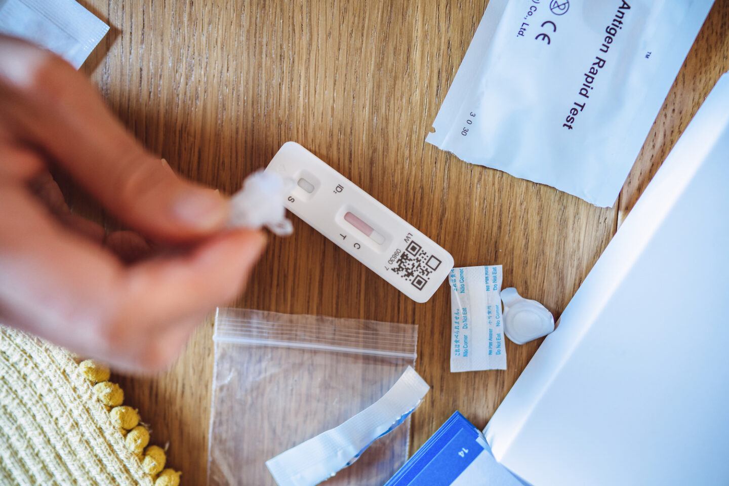 A woman taking an at-home Covid test