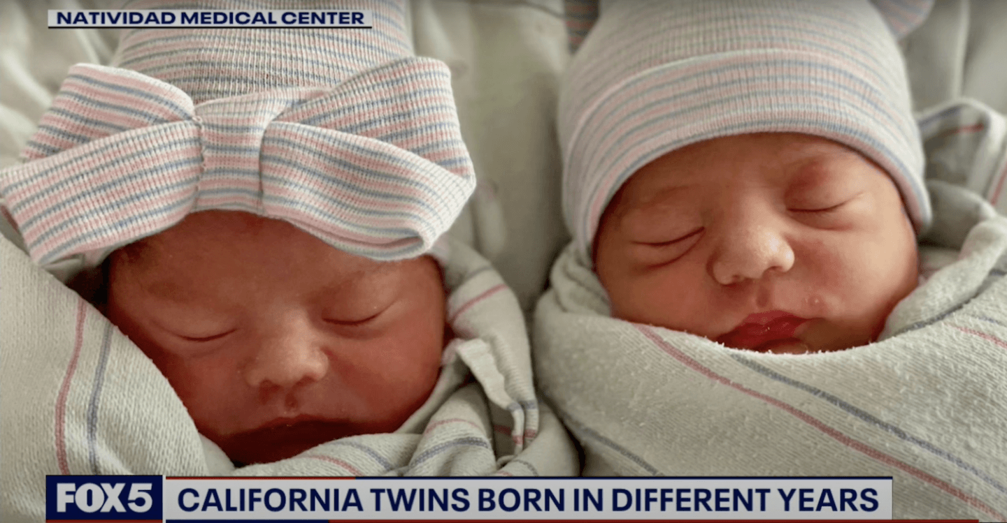 Newborn twins born in different years