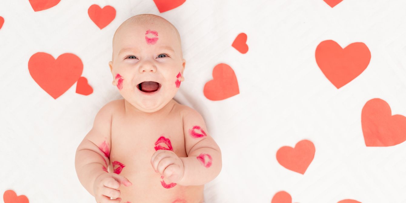 baby covered in kisses- baby names inspired by love