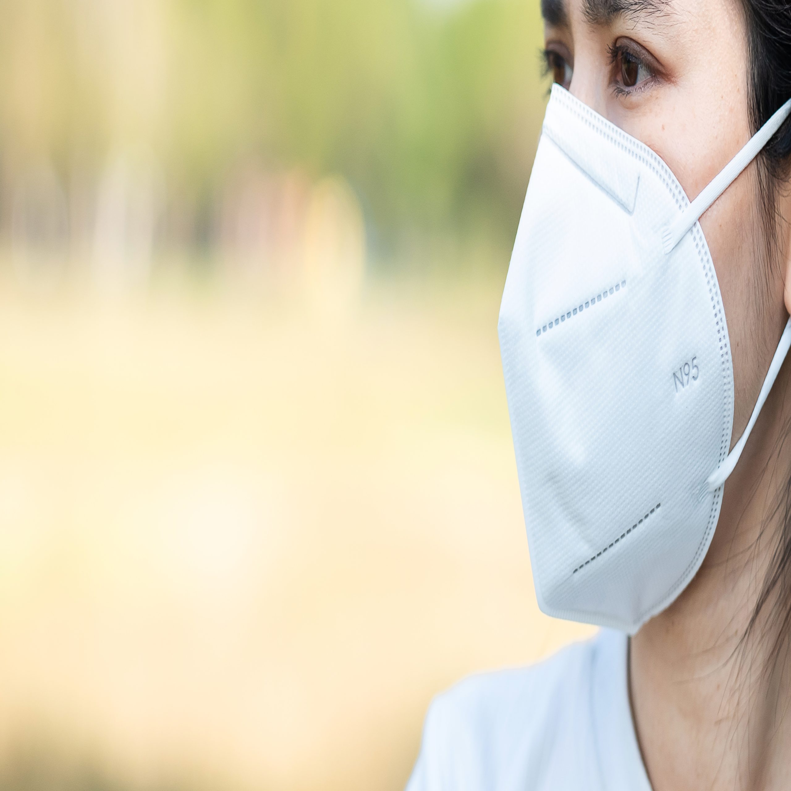 Woman wearing an N95 face mask