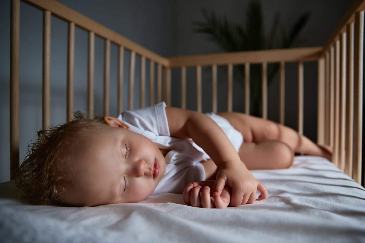 Baby sleeping at night in crib