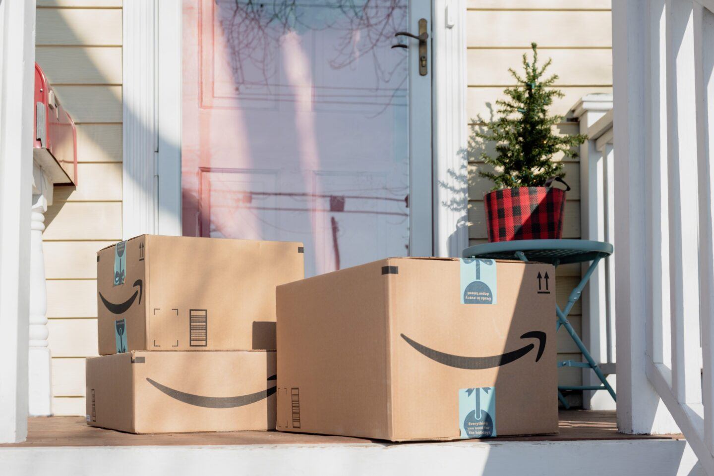 amazon packages sitting on a porch