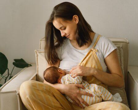 newborn baby boy sucking milk from mothers breast portrait of mom and breastfeeding baby concept of t20 vOpvL3