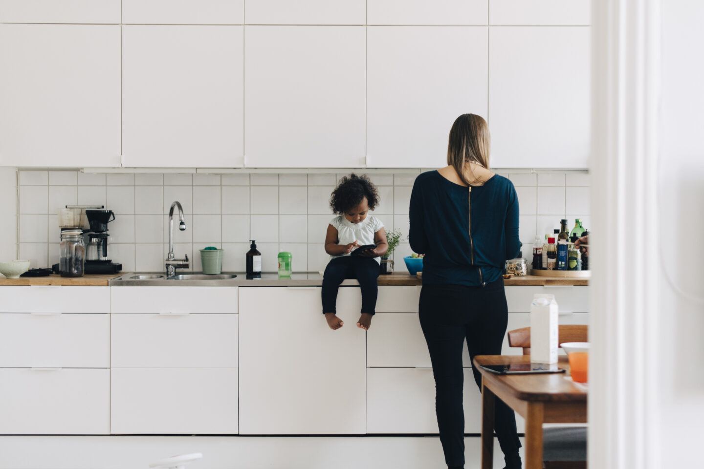 mom and daughter in kitchen