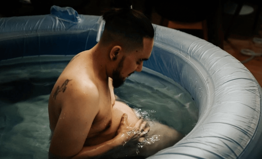 non-binary person water birth