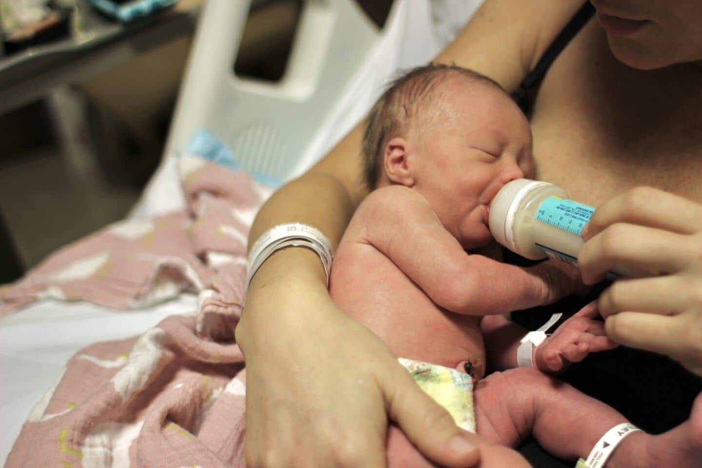 didn't breastfeed newborn: newborn with bottle