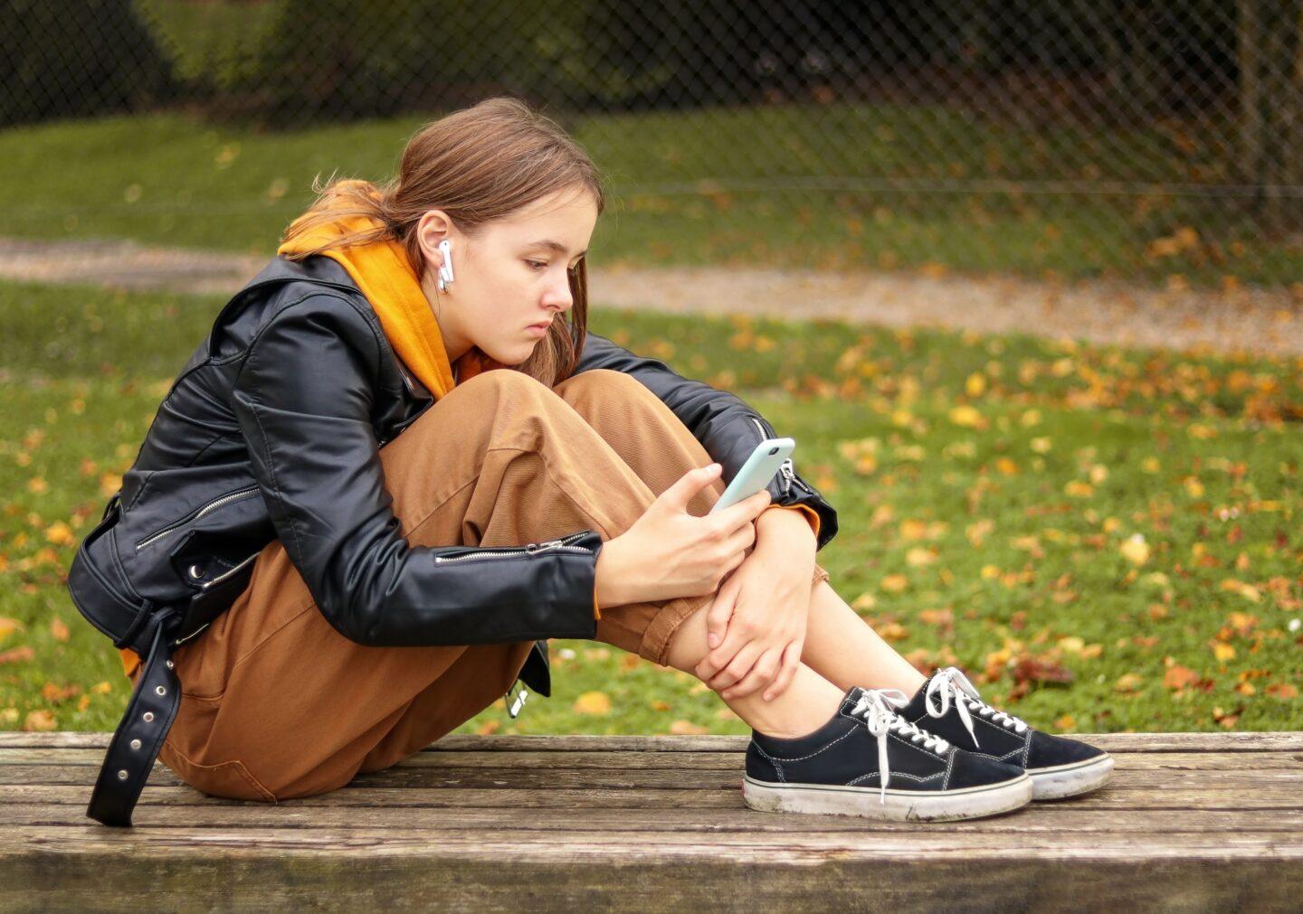 tween girl on a phone