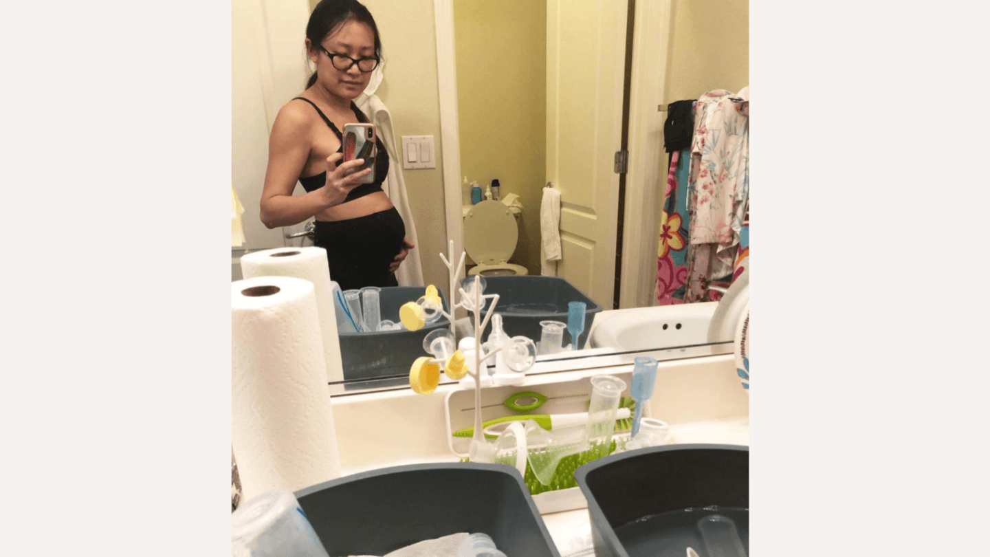 4th Trimester: postpartum mom standing in front of mirror