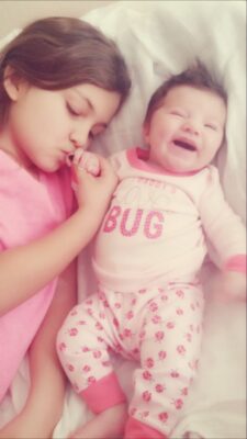 the heartwarming reason why this 8 year old delivered her baby sister featured Motherly