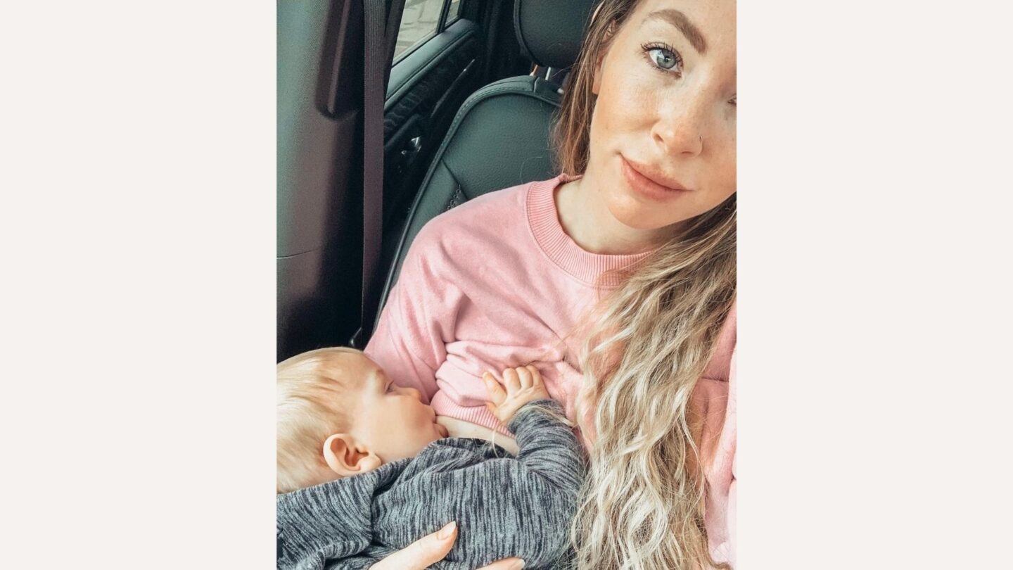 breastfeeding is not easy: mom breastfeeding child