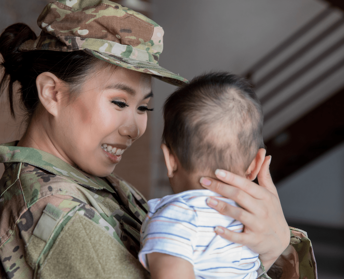 U.S. Army mother holding baby