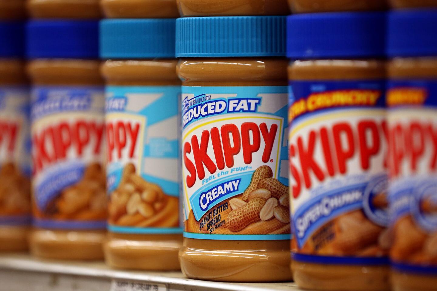 Skippy peanut butter on grocery shelf