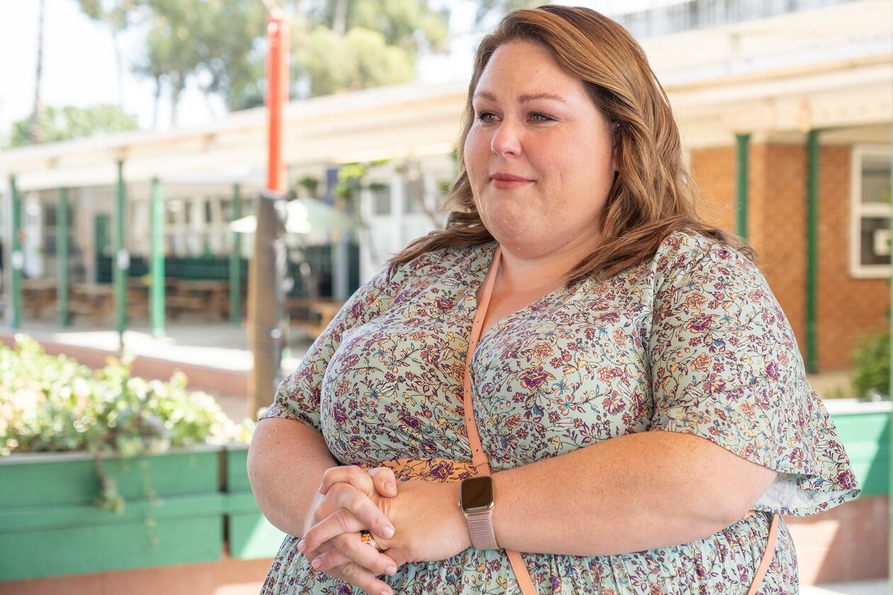 Kate Pearson: Chrissy Metz's character standing alone with hands clasped
